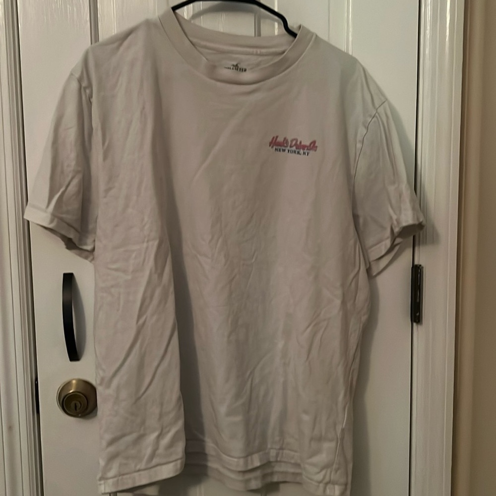 Hollister funny graphic tee. Hanks dine in New York NY